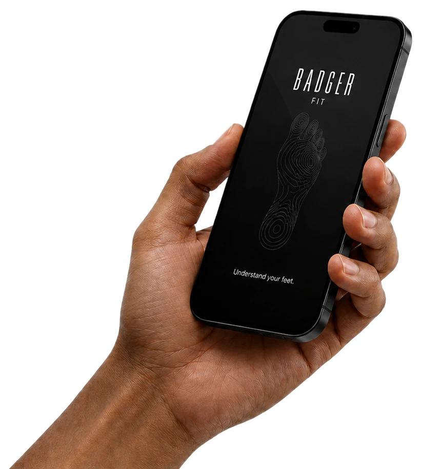 Illustrative BadgerFit welcome screen on a phone held in one hand.